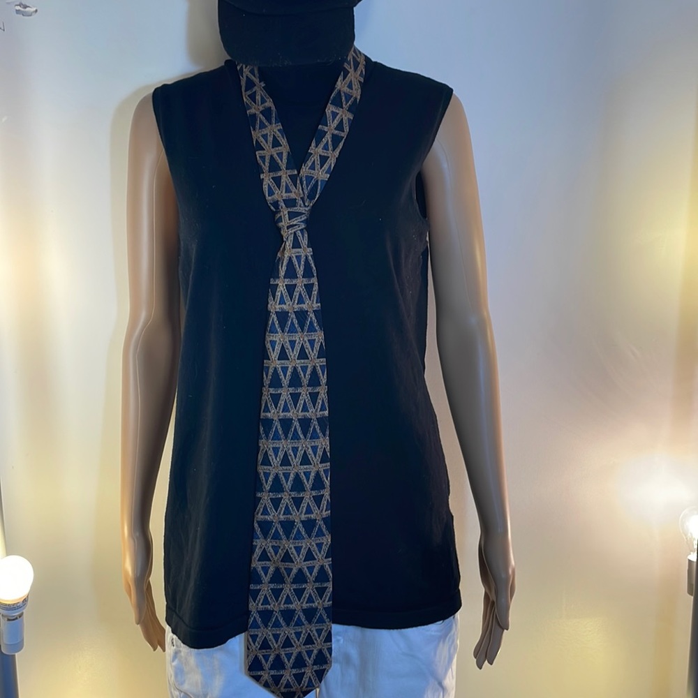 Nates, lighter, blues, terra-cotta, and beige, beautiful tie